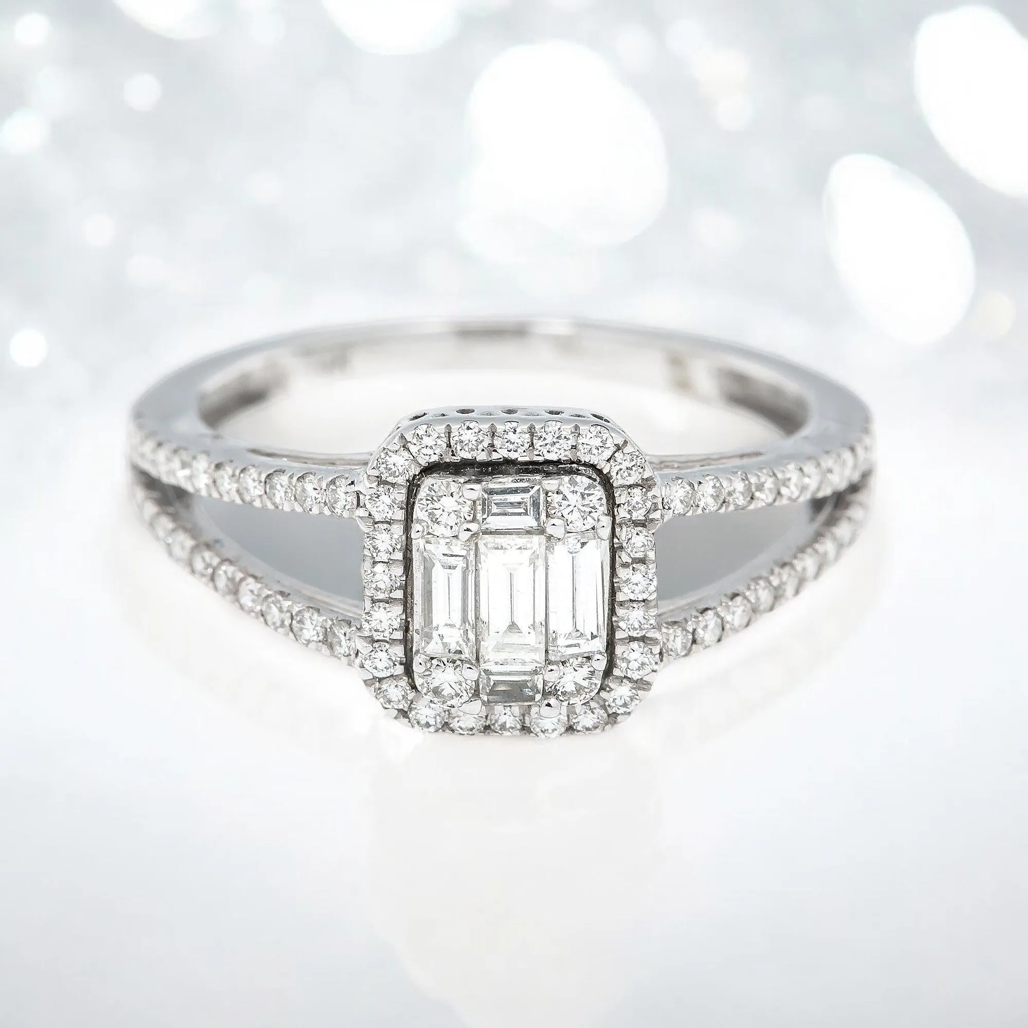 14K GOLD BAGUETTE DIAMOND RING WITH HALO AND SPLIT SHANK 0.75 CT