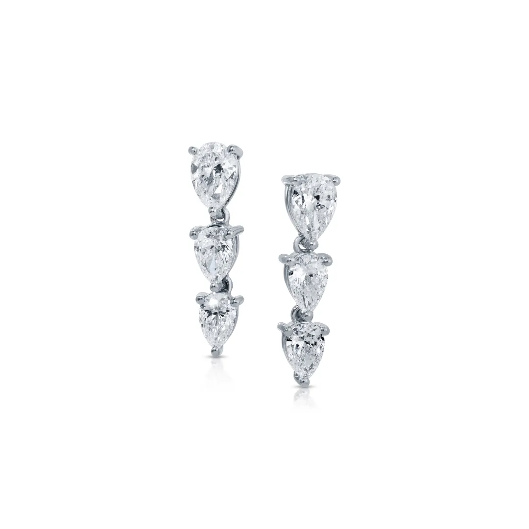 TRE GRADUATED PEAR DIAMOND DROP EARRINGS